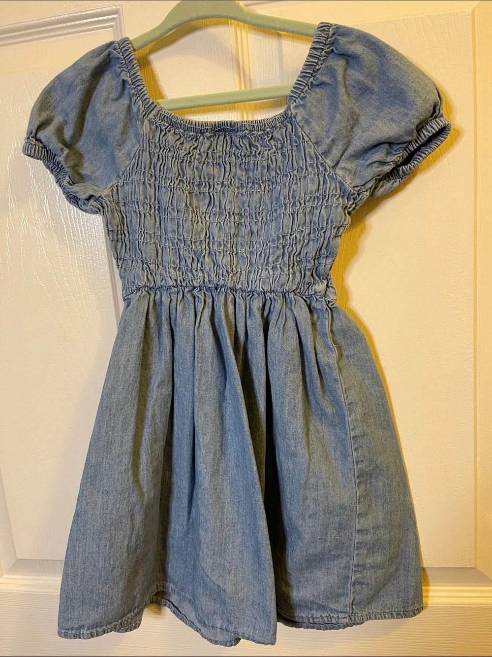 A Children’s Place.” Girls' Light Blue Chambray Smocked Dress - Picture 2 of 4